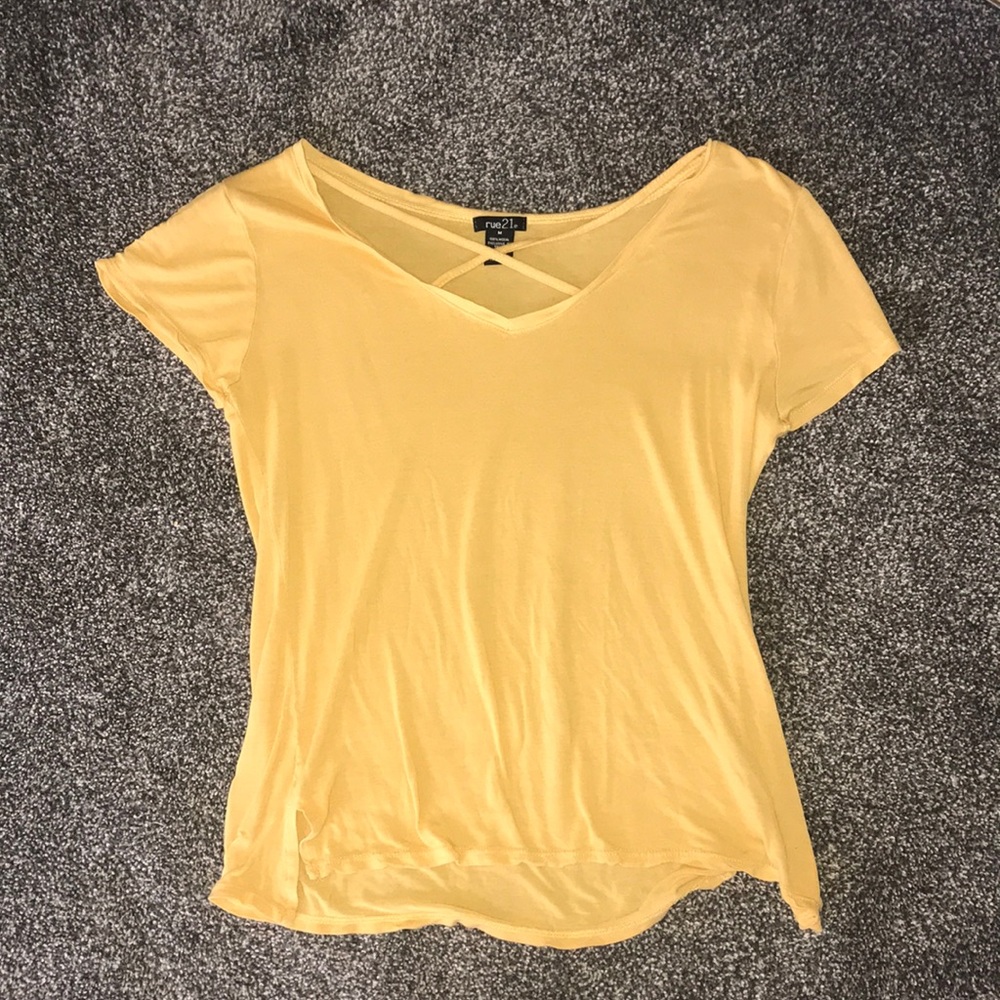 Yellow shirt cross cross